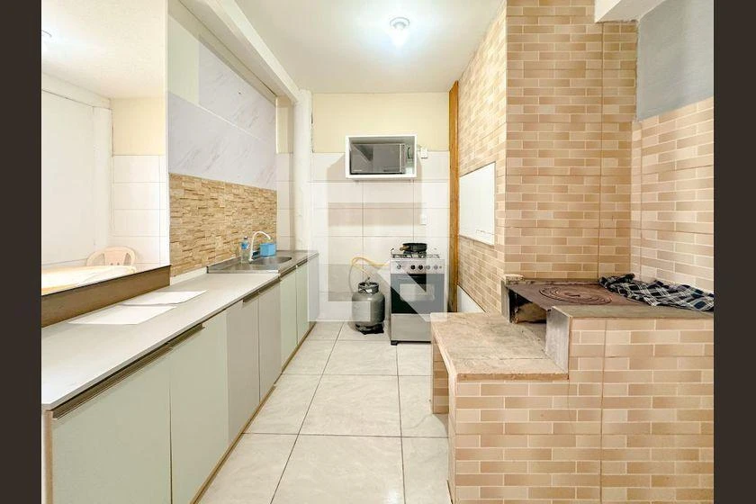 2-bedroom apartment in a building with a pool — photo 29