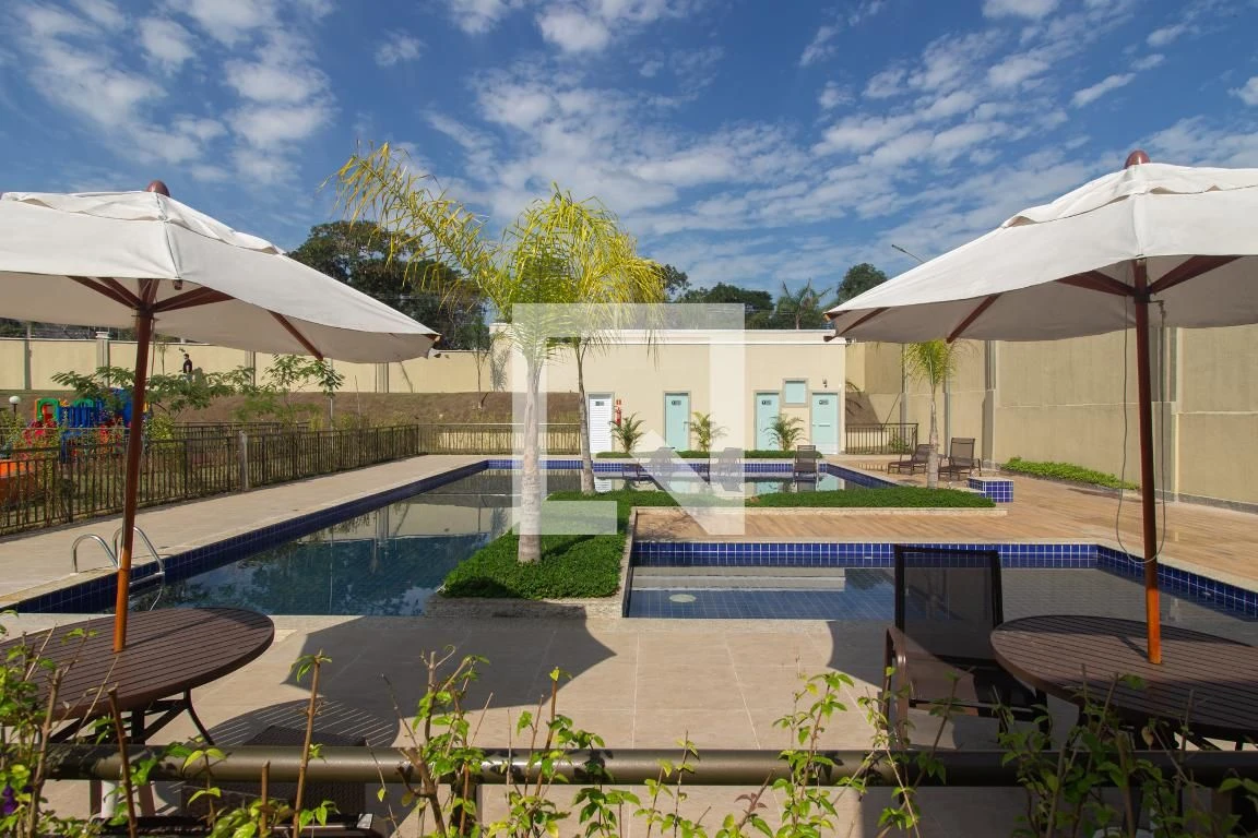 2-bedroom apartment in a building with a pool — photo 5
