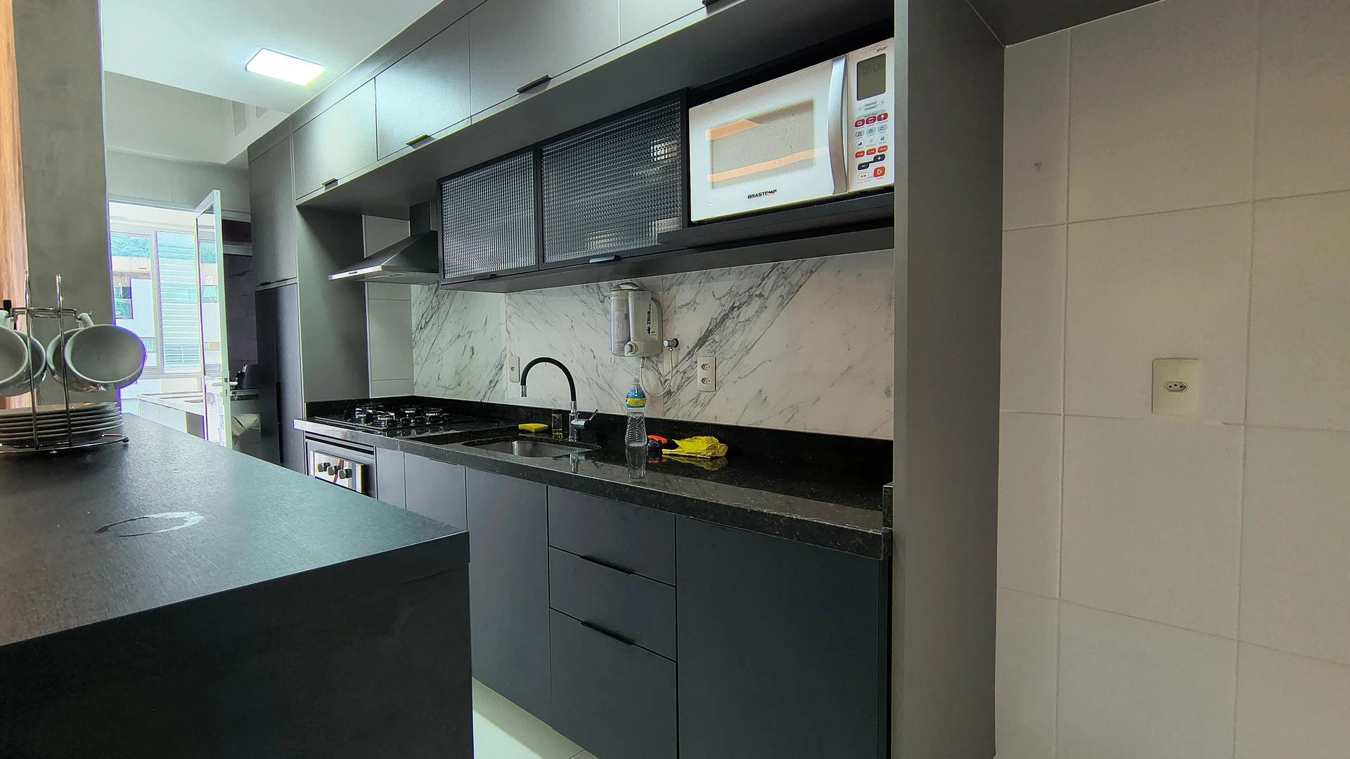 2-bedroom apartment with an enclosed, floor-to-ceiling balcony — photo 2
