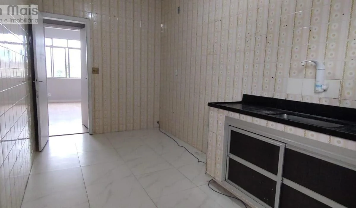 1-bedroom apartment with a closed kitchen and cabinetry — photo 13