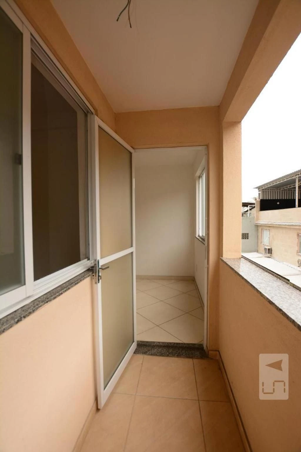 2-bedroom apartment with balcony sink and utility area — photo 30
