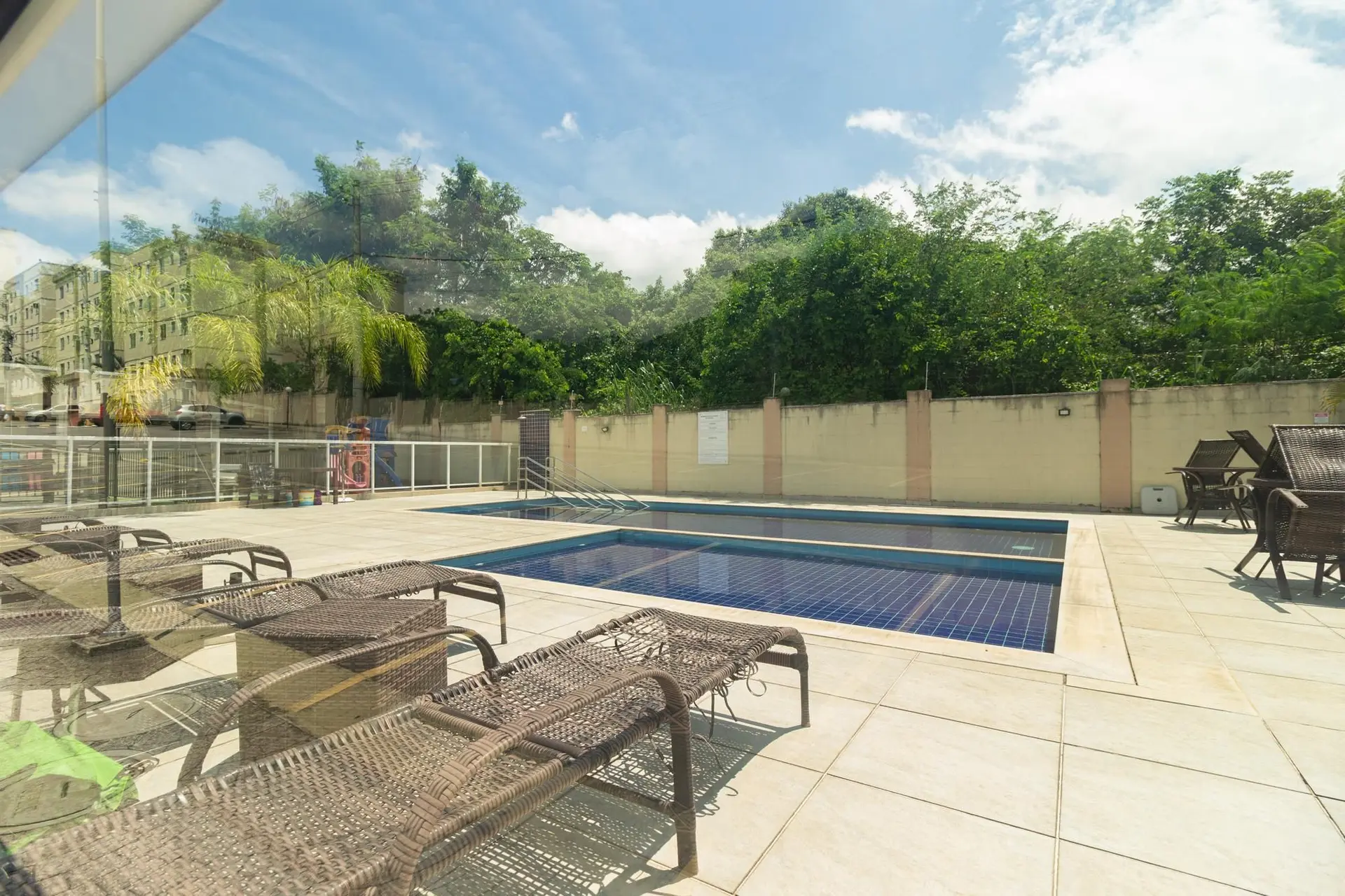 2-bedroom apartment in a building with a pool — photo 52