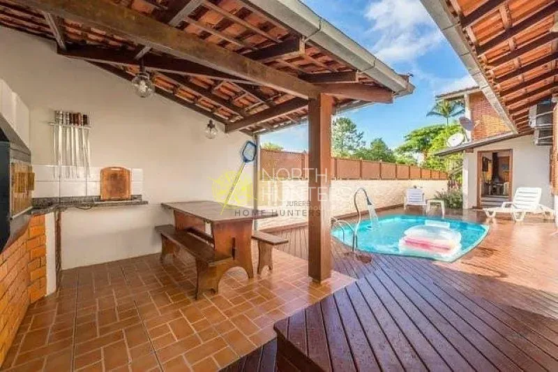 Casa com 4 dormitórios, 2 suítes e churrasqueira na varanda — photo 4