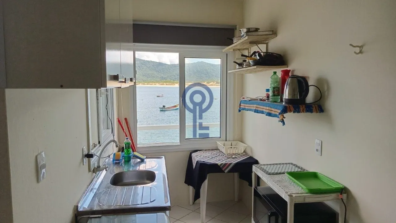 Furnished 1-bedroom apartment with water and mountain views — photo 10