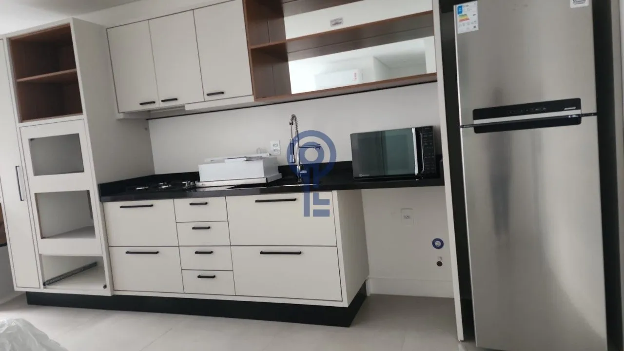 Furnished 59 m² studio with open-plan kitchen and electric stove — photo 7