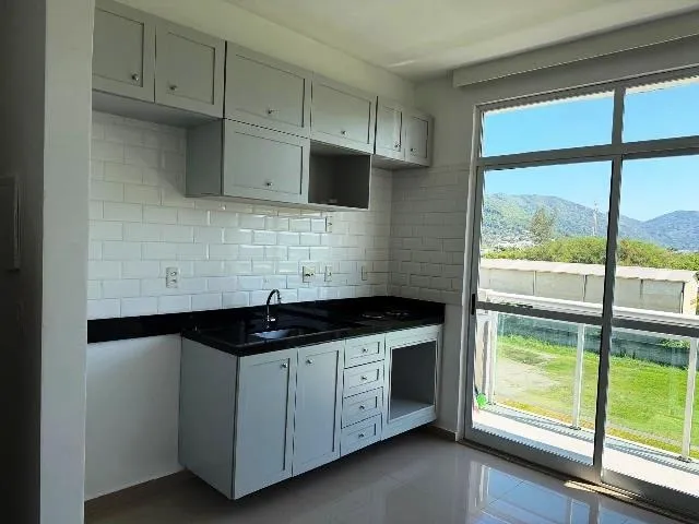 1-bedroom apartment with open-plan kitchen and parking — photo 5