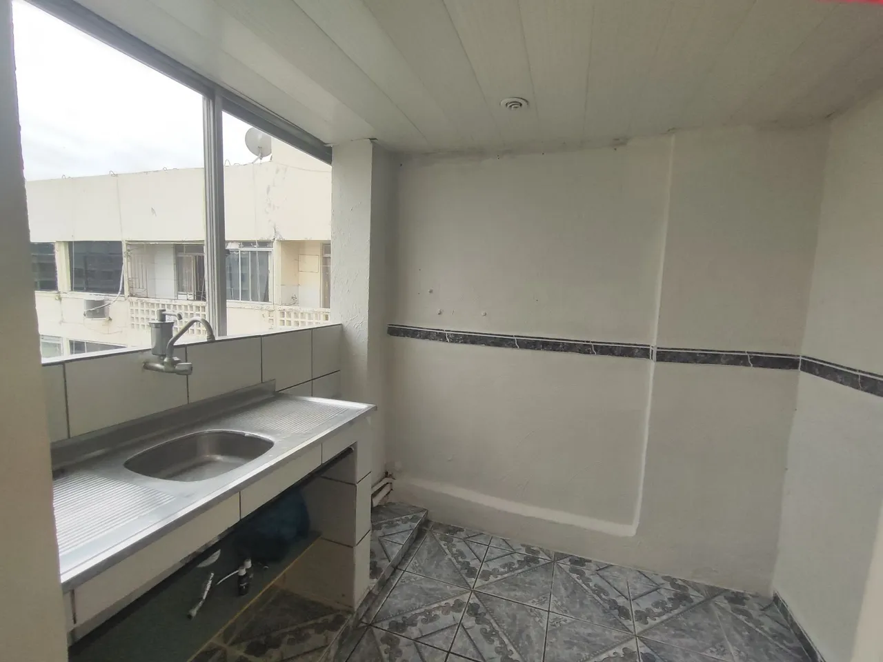 2-bedroom apartment in a building with a pool — photo 15