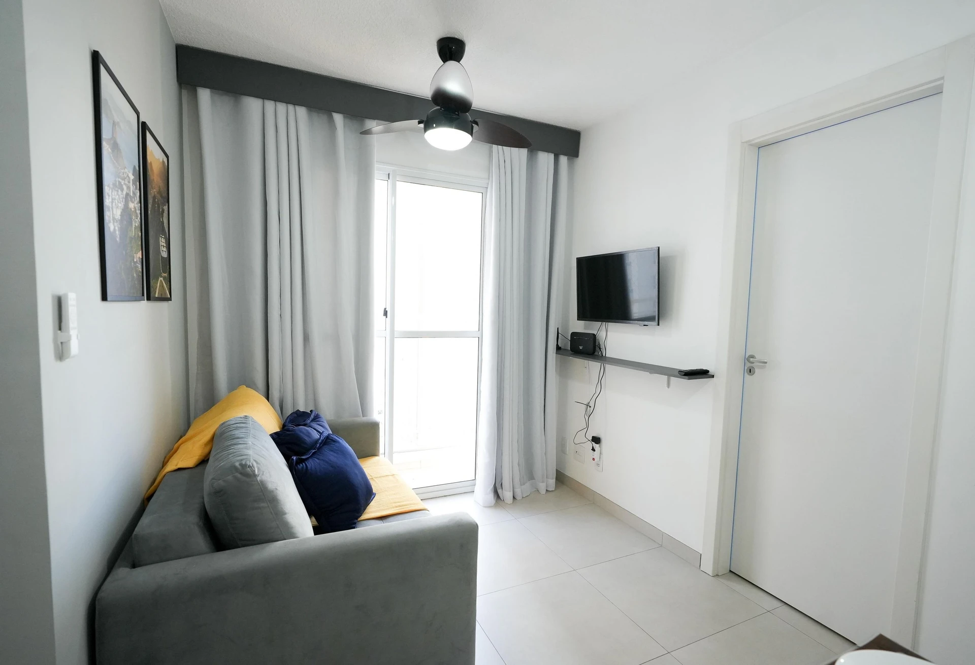 Furnished apartment with open-plan kitchen and balcony