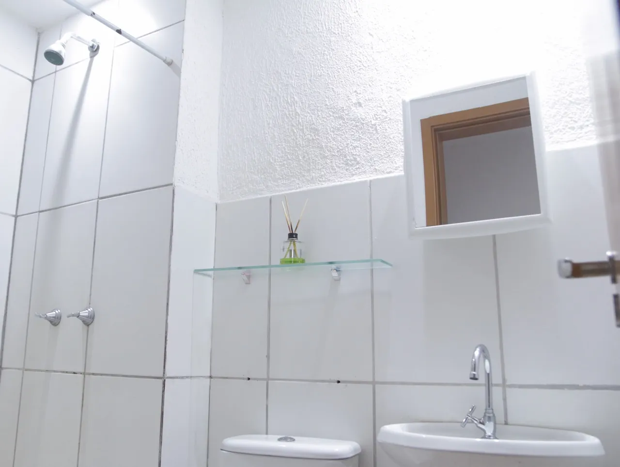 2-bedroom apartment in a building with a pool — photo 14