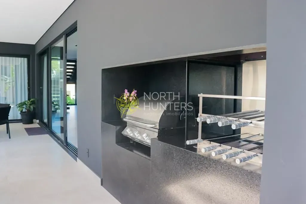 Casa mobiliada de 5 suítes com 646 m² e 4 vagas — photo 37