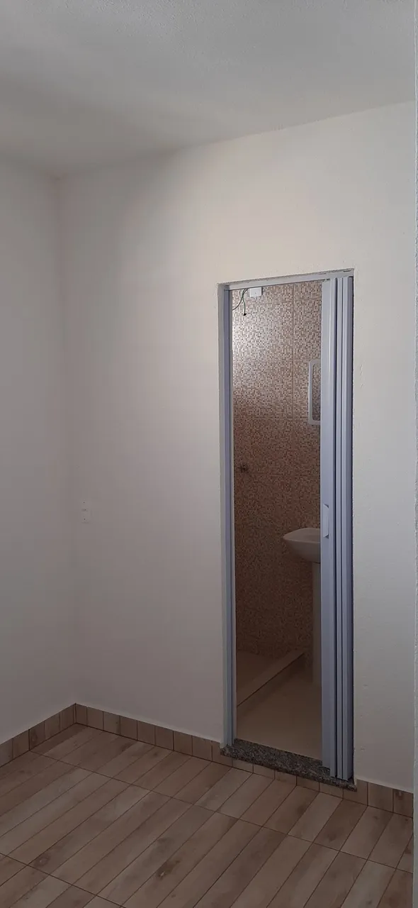 Studio-sized kitinete with 1 bedroom and compact kitchenette — photo 11