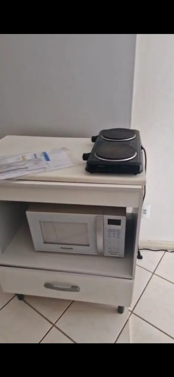 Studio kitnet with a compact cooktop and 1 bedroom — photo 13
