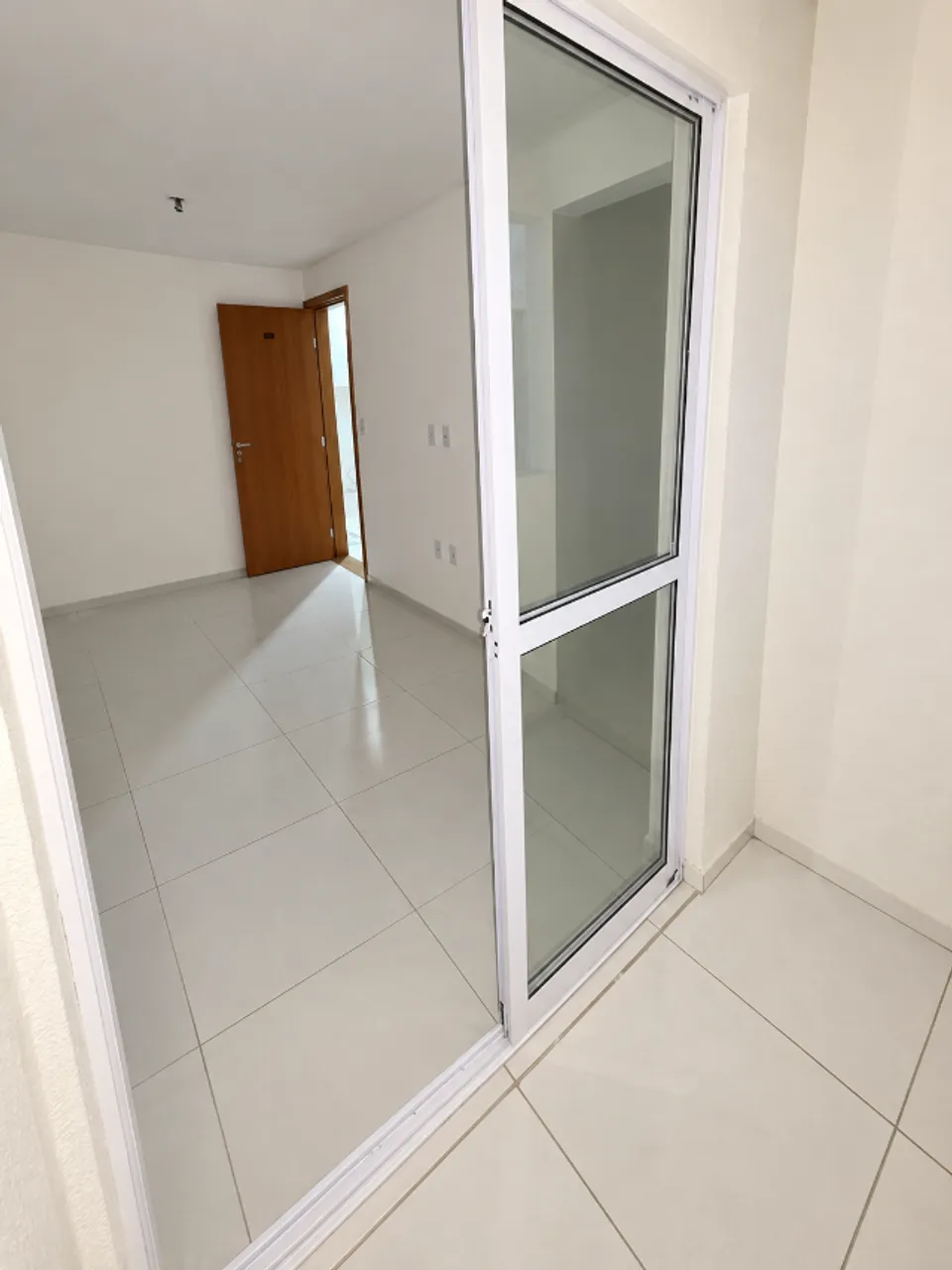 2-bedroom apartment in a building with a pool — photo 9