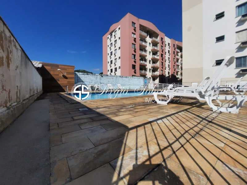 2-bedroom apartment in a building with a pool — photo 9