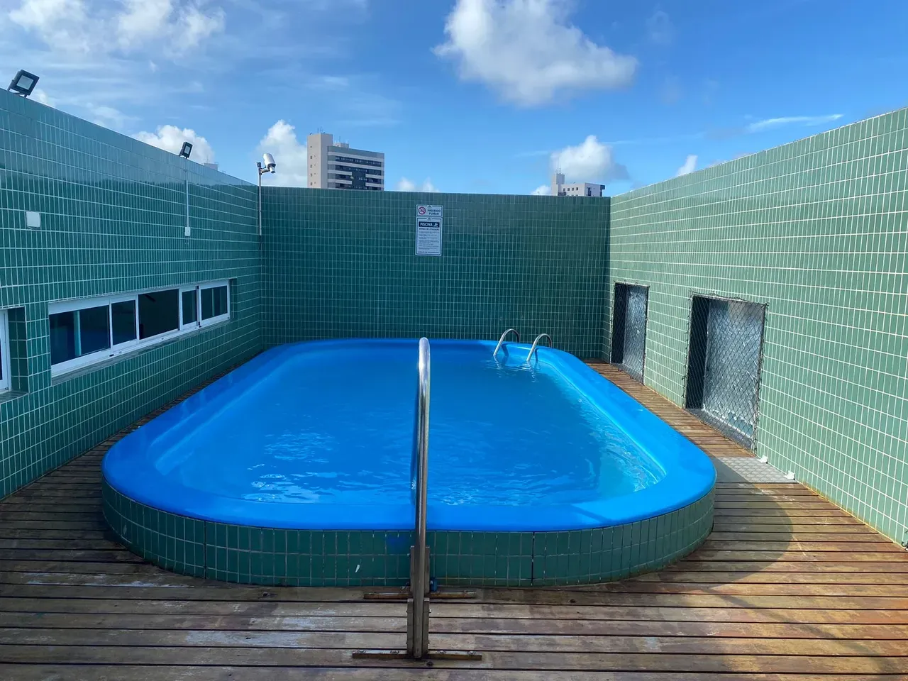 2-bedroom apartment in a building with a pool — photo 3