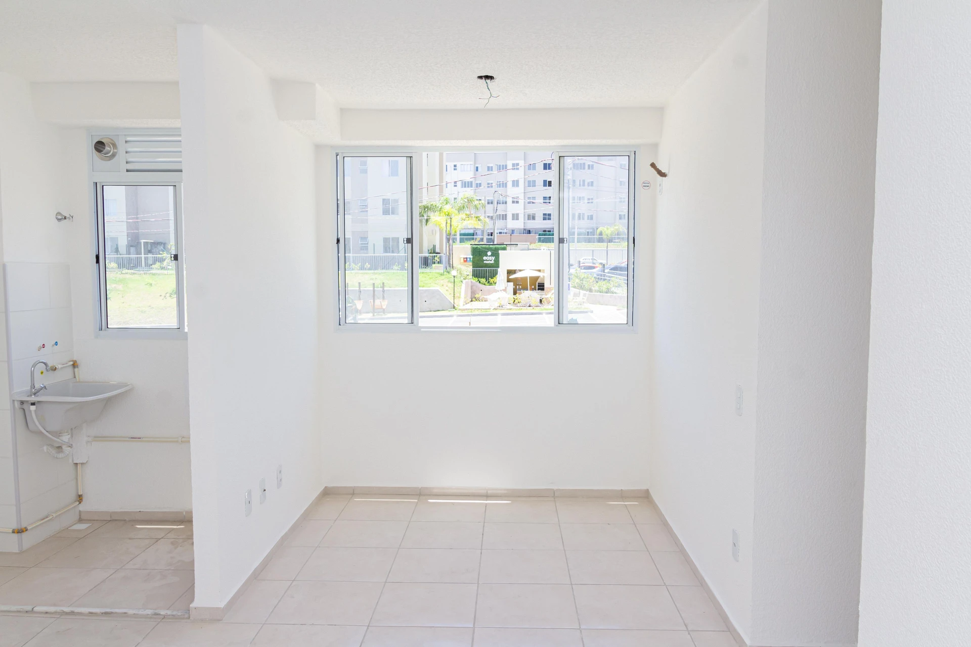 2-bedroom apartment in a building with a pool — photo 7