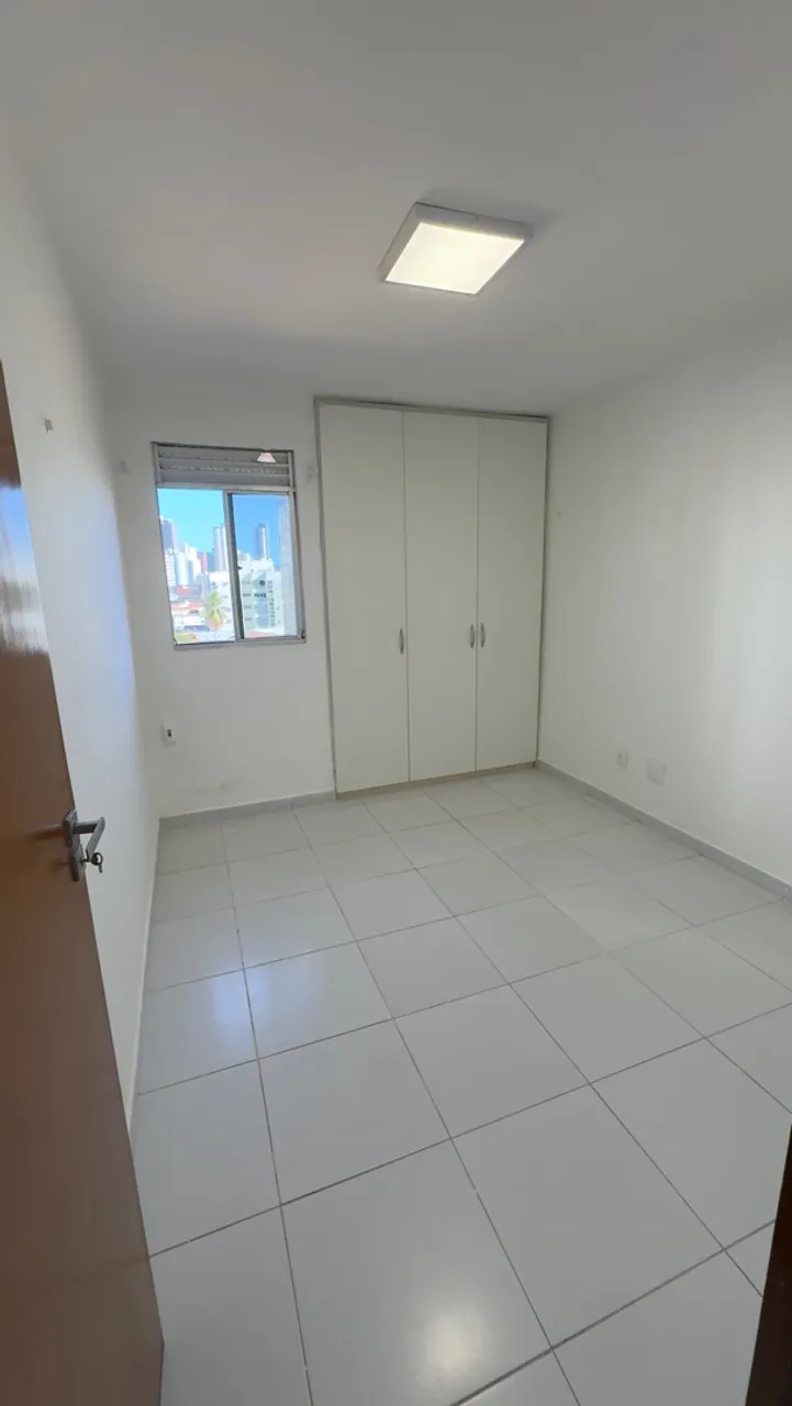 3-bedroom apartment in a building with a pool — photo 4