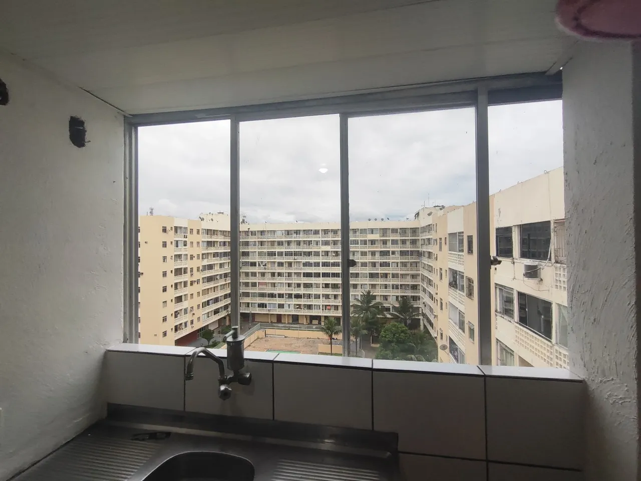 2-bedroom apartment in a building with a pool — photo 12