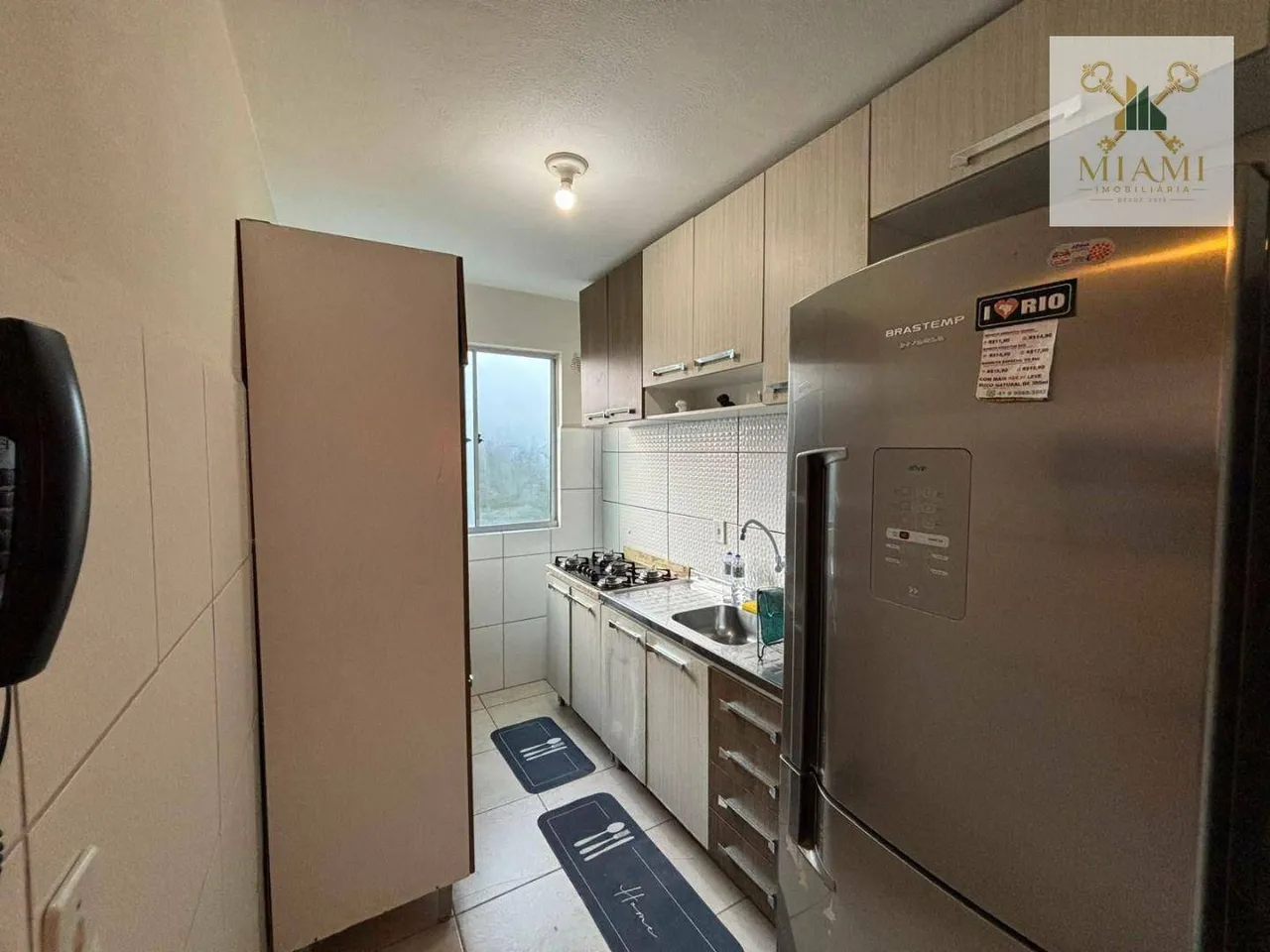 2-bedroom rental apartment with open-plan kitchen and parking — photo 7