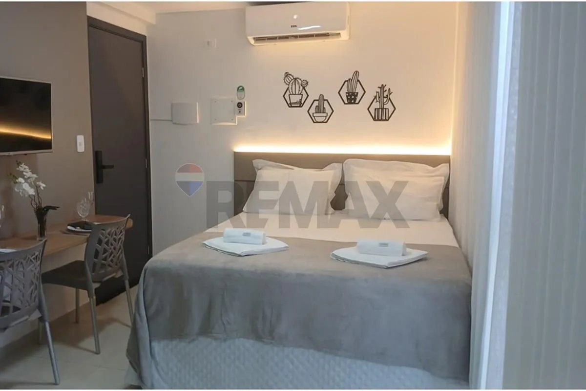 One-bedroom apartment in a building with a pool — photo 19