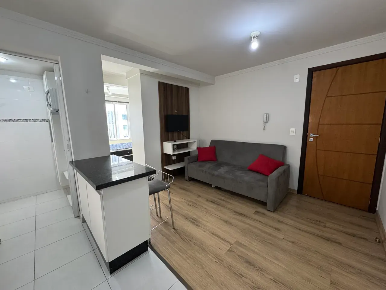 1-bedroom apartment with open kitchen and gas stove — photo 12