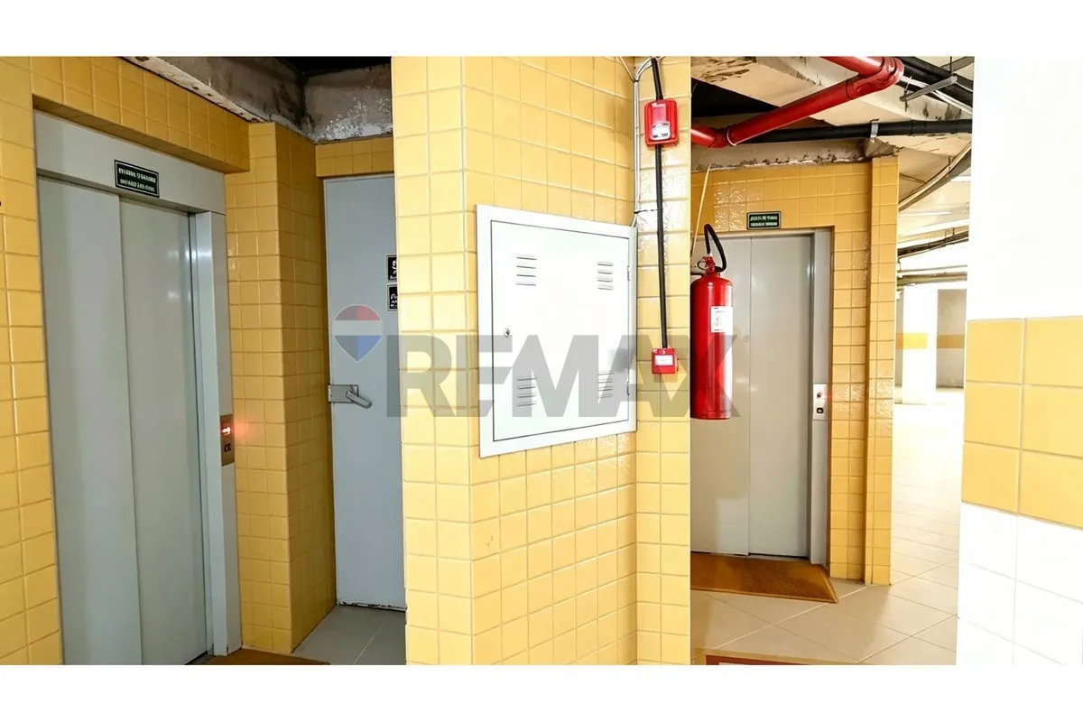 One-bedroom apartment in a building with a pool — photo 15