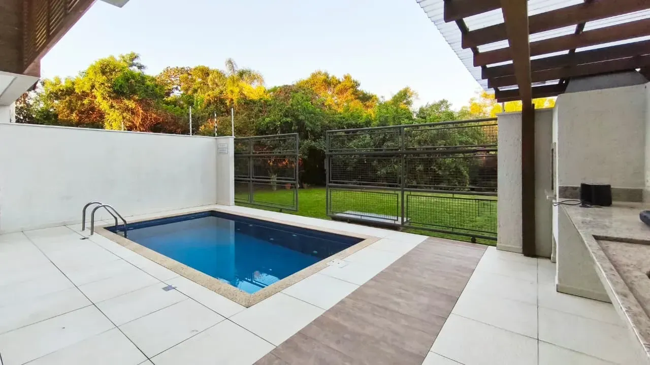 2-bedroom apartment in a building with a pool — photo 12