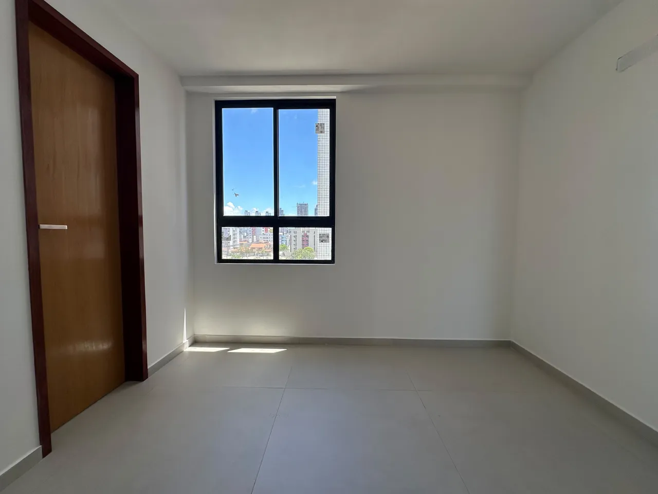 2-bedroom apartment in a building with a pool — photo 6