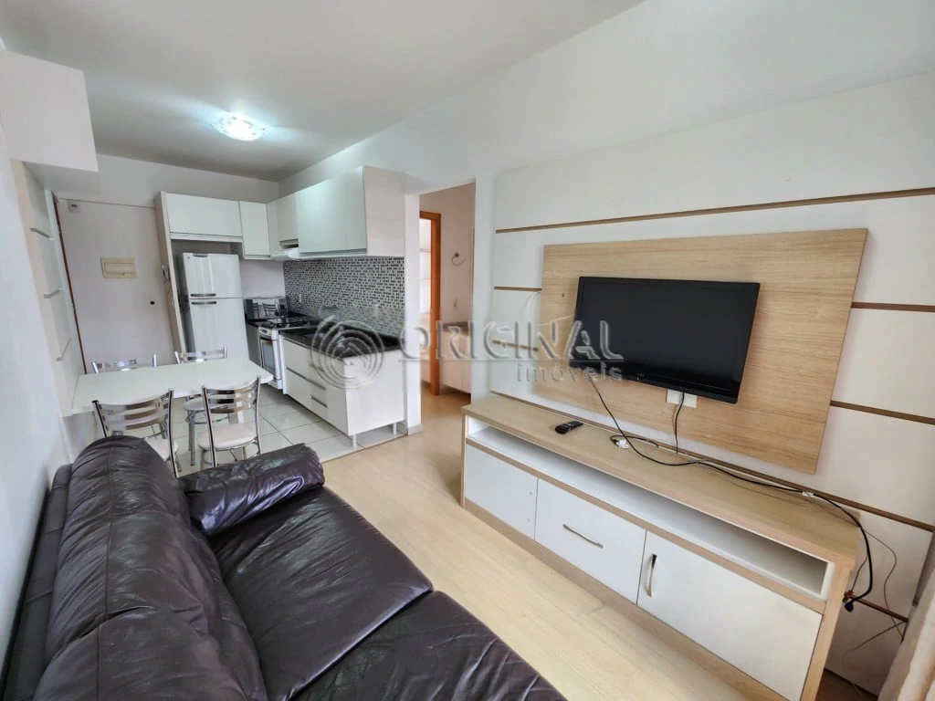 One-bedroom apartment in a building with an indoor pool