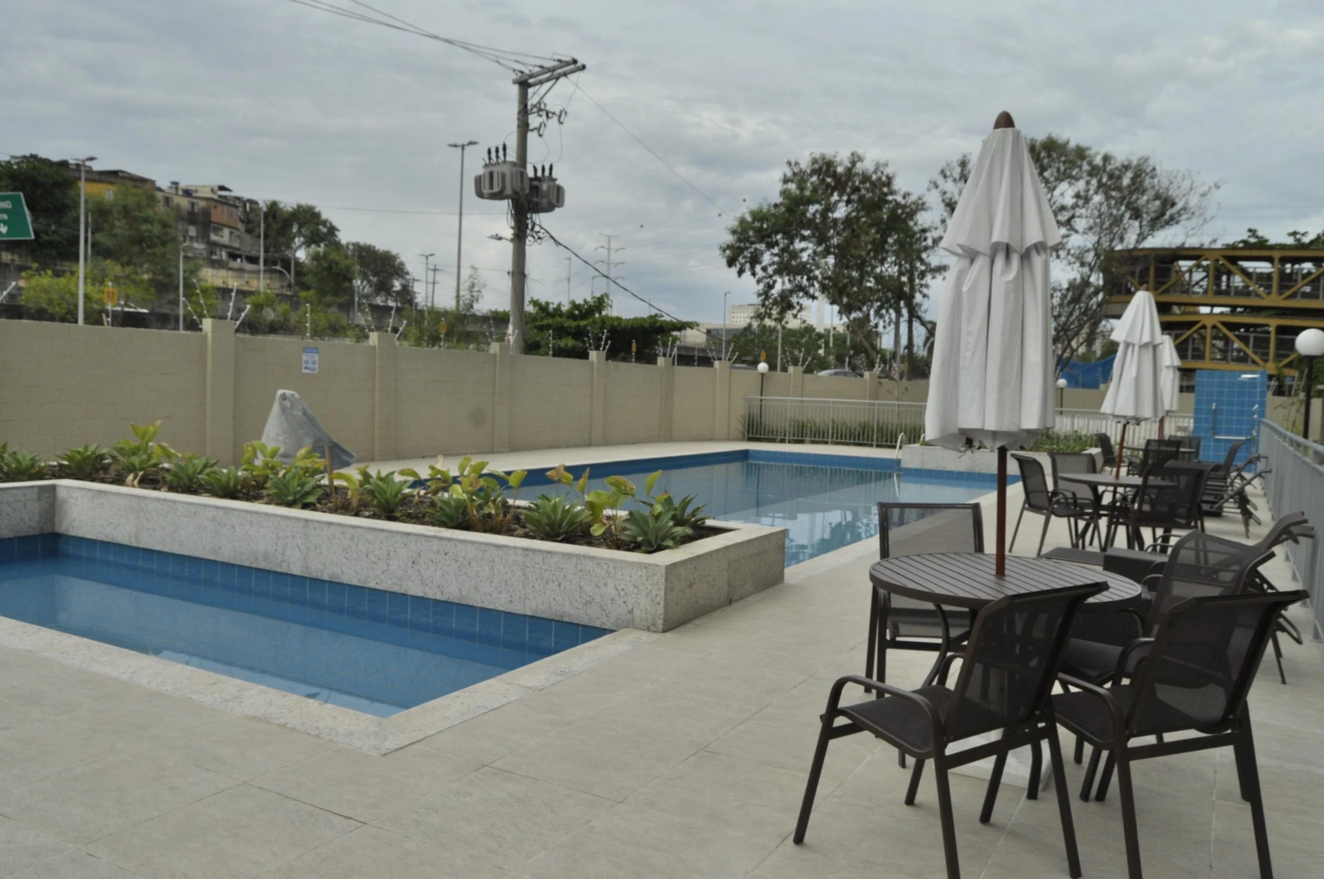2-bedroom apartment in a building with a pool — photo 7