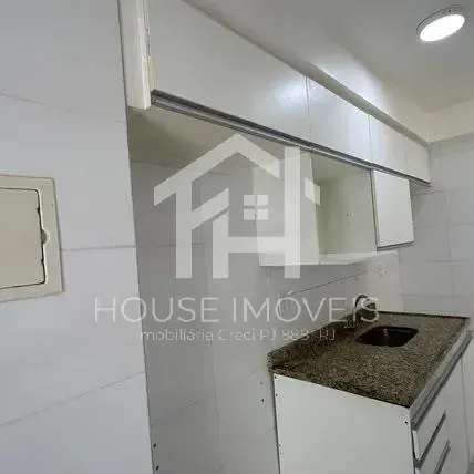 2-bedroom apartment in a building with a tennis court — photo 17