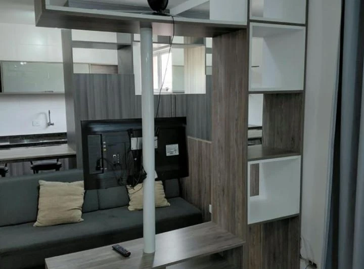 Furnished studio apartment with an open-plan kitchen — photo 8
