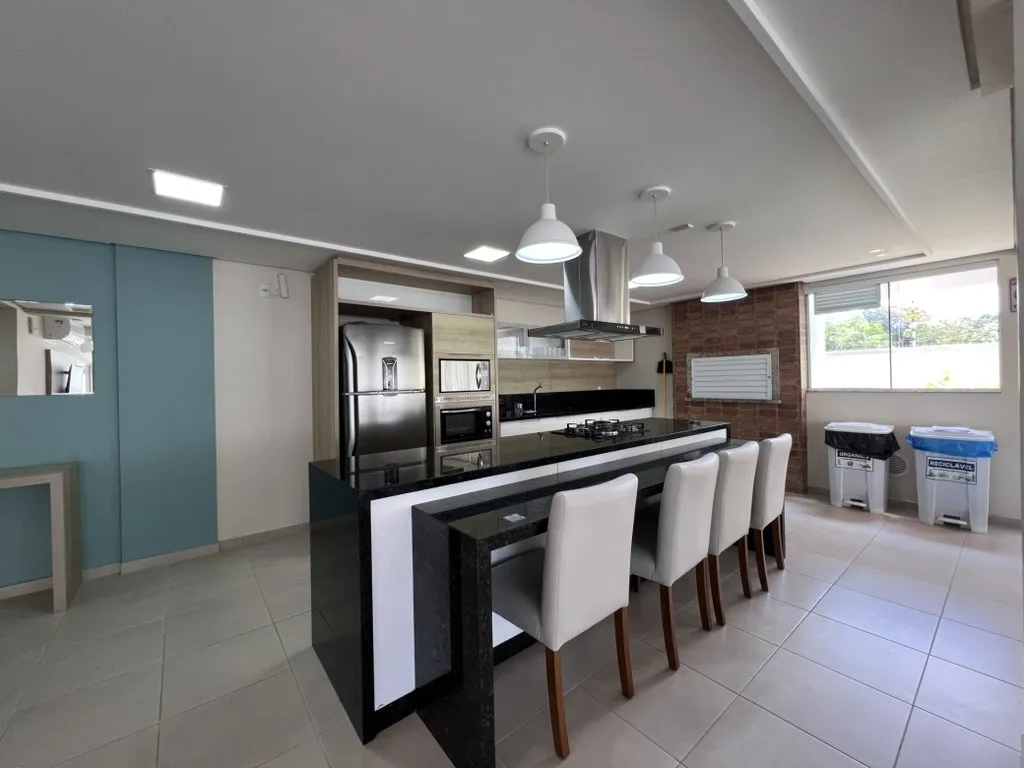 One-bedroom apartment in a building with a pool — photo 14