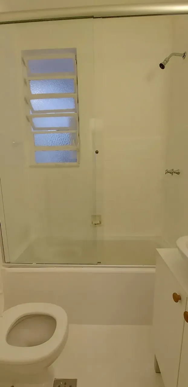 1-bedroom apartment with wood floors and glass shower — photo 17