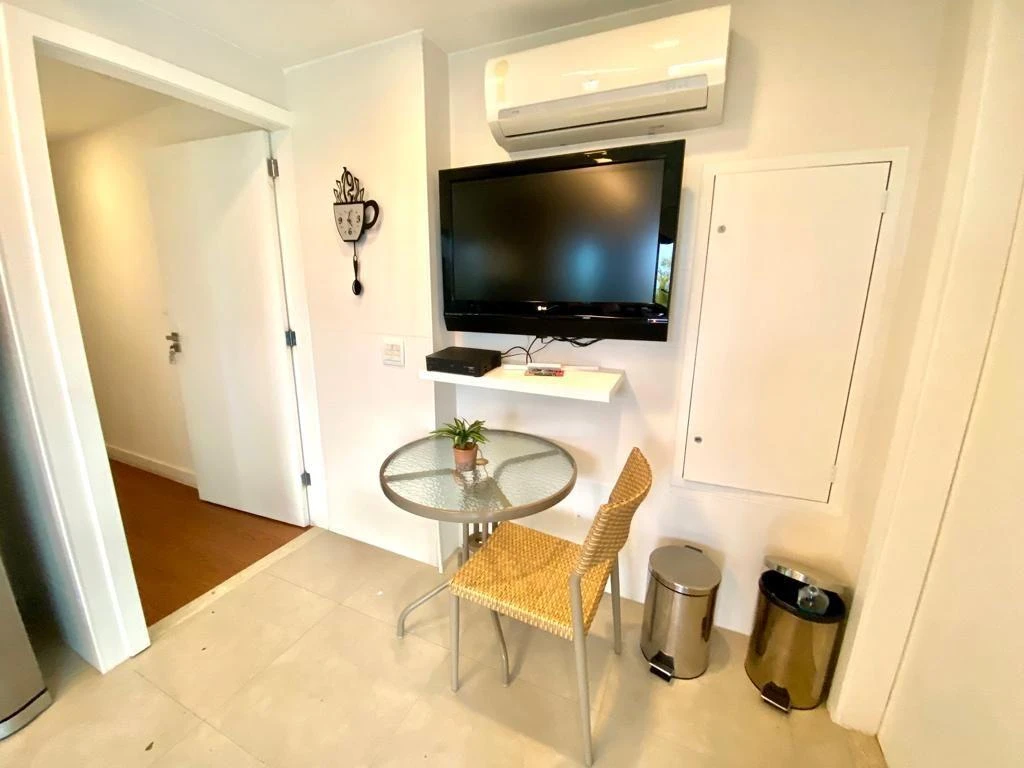 Furnished penthouse with balcony and open-plan kitchen — photo 16