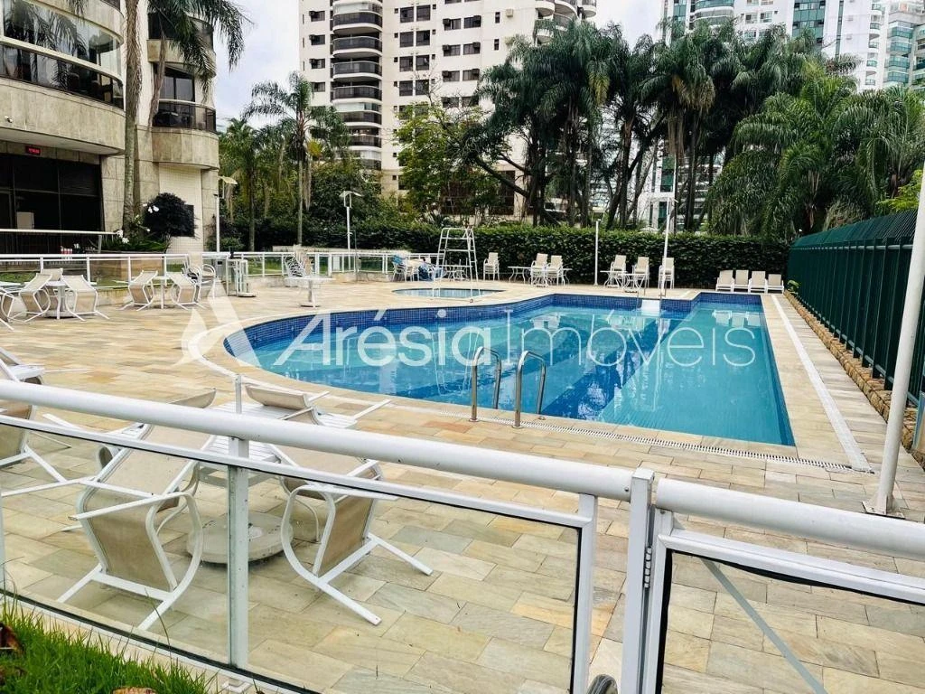 2-bedroom apartment in a building with a pool — photo 5