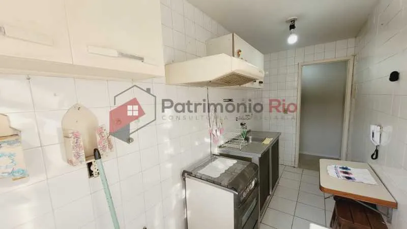 2-bedroom apartment in a building with a pool — photo 26