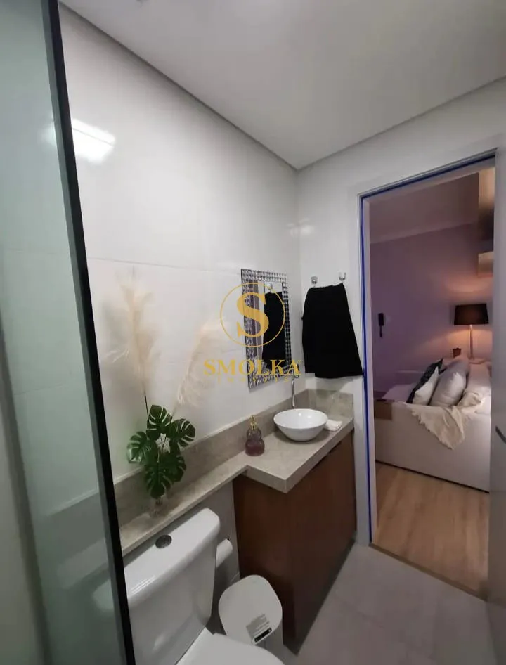Furnished studio with integrated kitchen and glass shower — photo 13