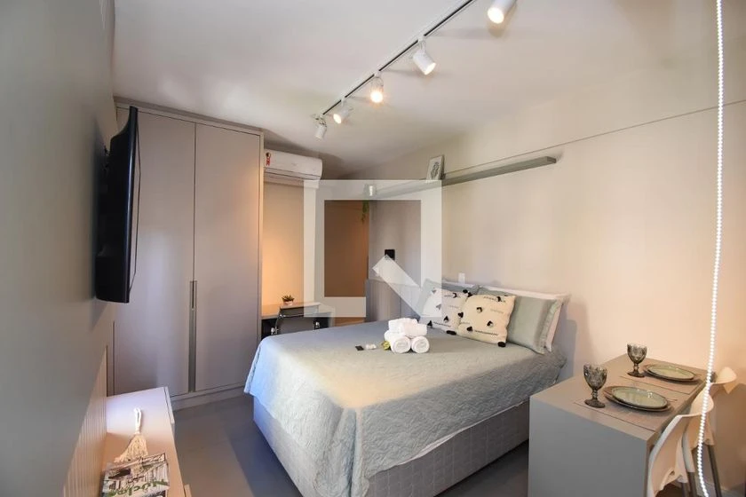 Furnished studio with a balcony and compact kitchenette — photo 7