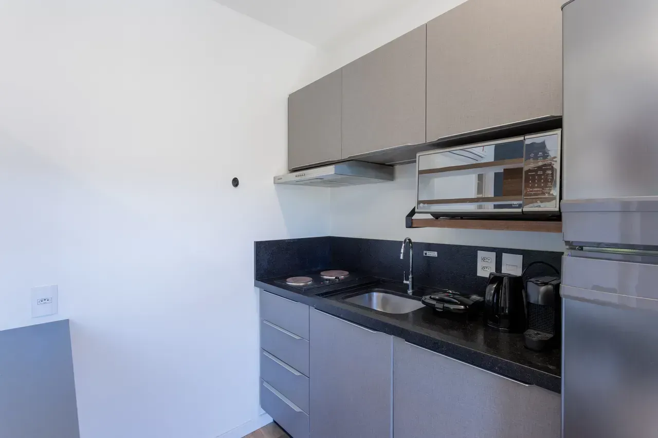 Furnished 1-bedroom apartment with a compact kitchenette