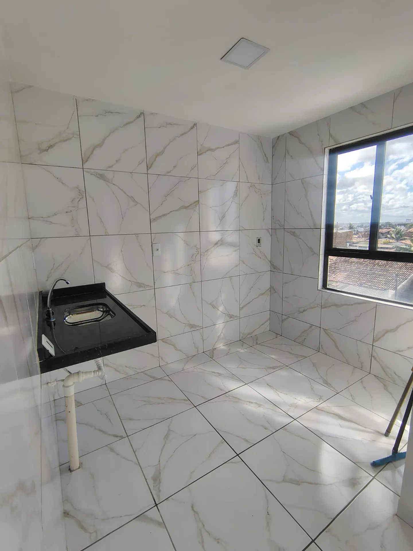 Apartamento de 2 quartos com suíte e 56 m²