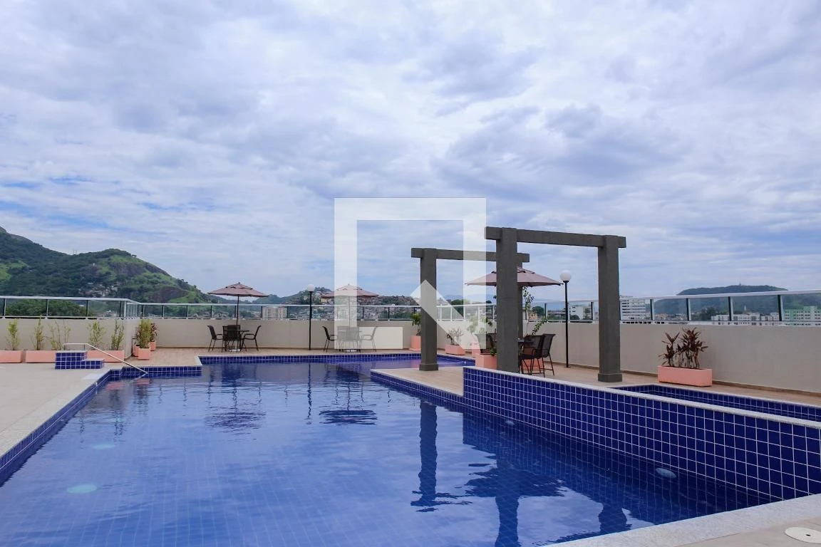 2-bedroom apartment in a building with a pool — photo 12