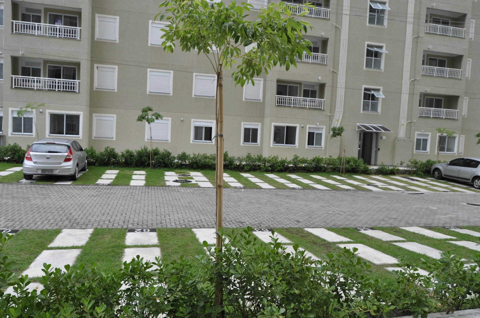 2-bedroom apartment in a building with a pool — photo 13