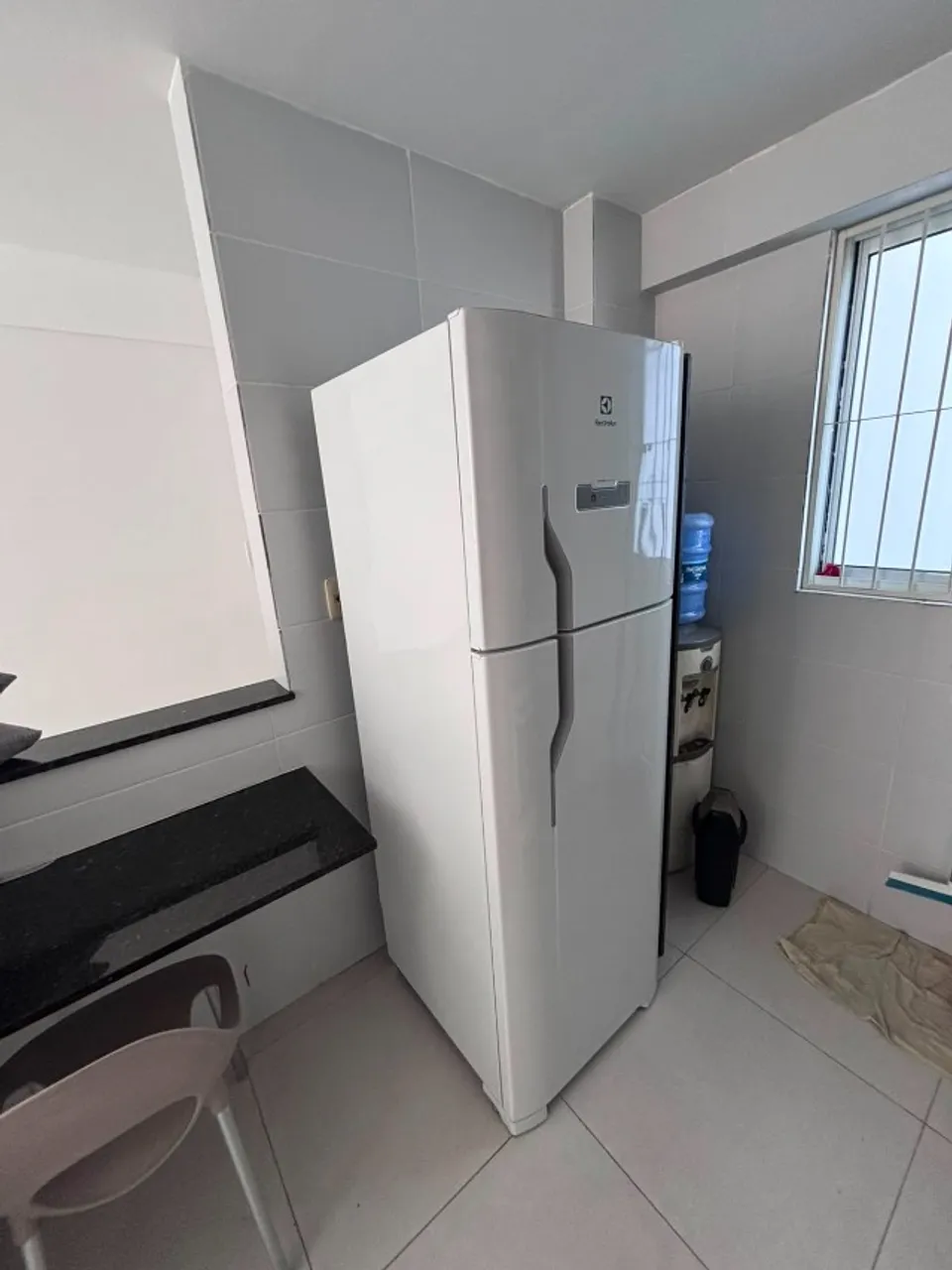 2-bedroom apartment in a building with a pool — photo 11