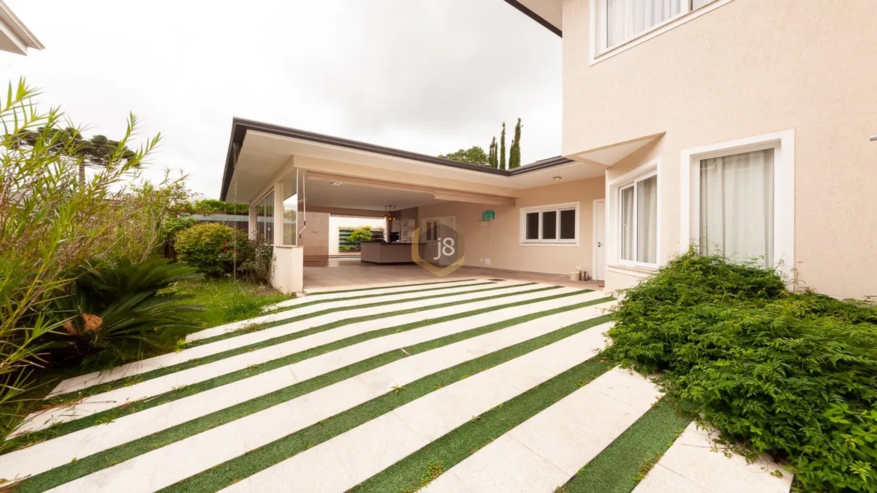 Casa com 5 suítes, 7 banheiros e 375 m² com varanda — photo 18