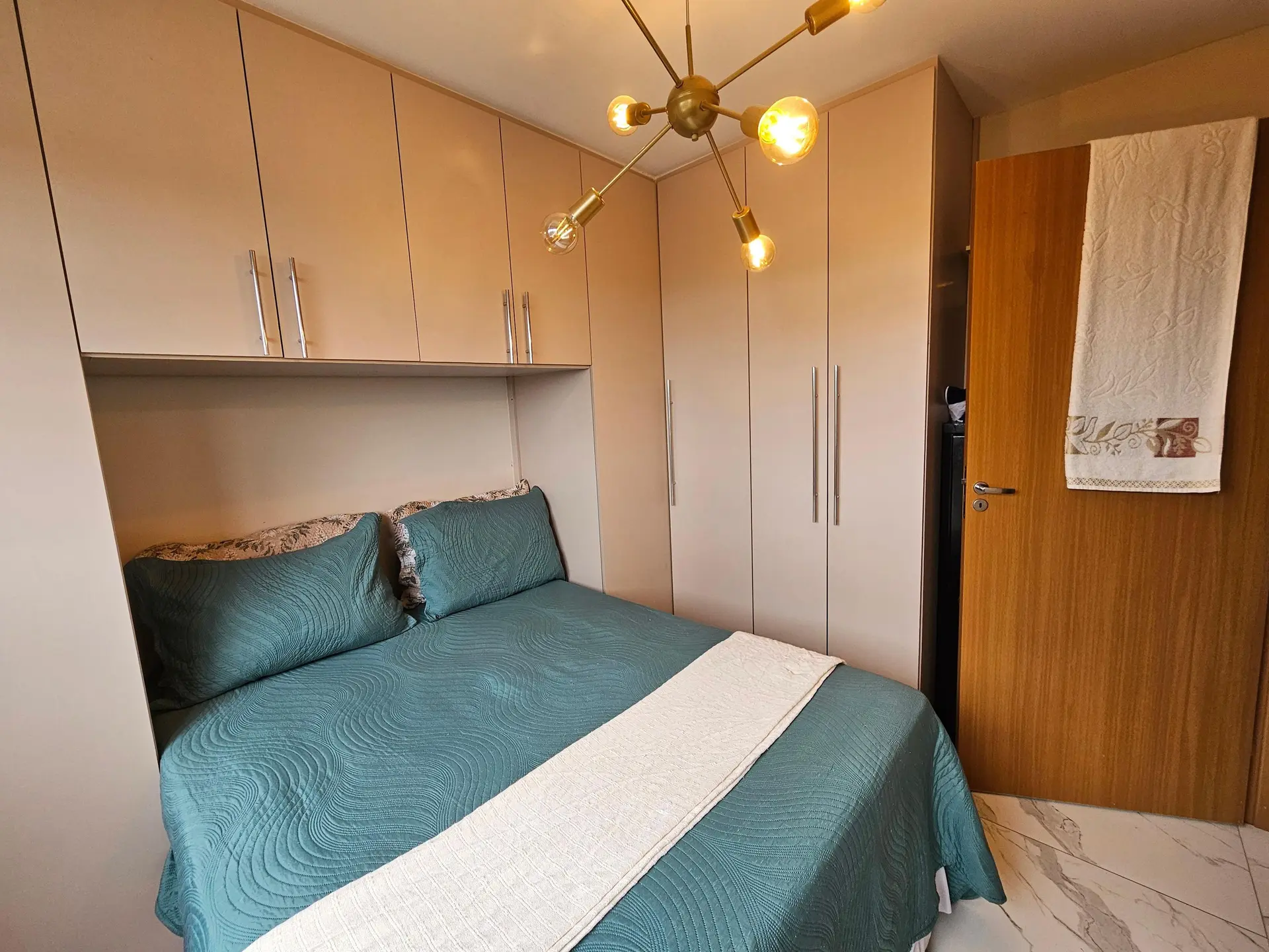 2-bedroom apartment in a building with a pool — photo 3