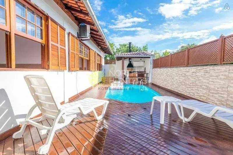 Casa com 4 dormitórios, 2 suítes e churrasqueira na varanda — photo 6