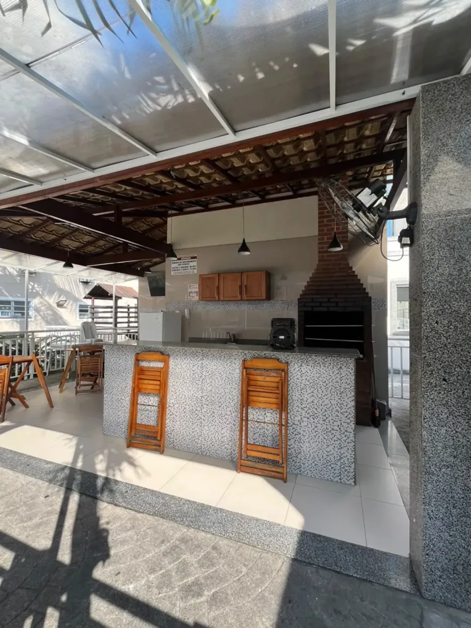 2-bedroom apartment in a building with a pool — photo 13