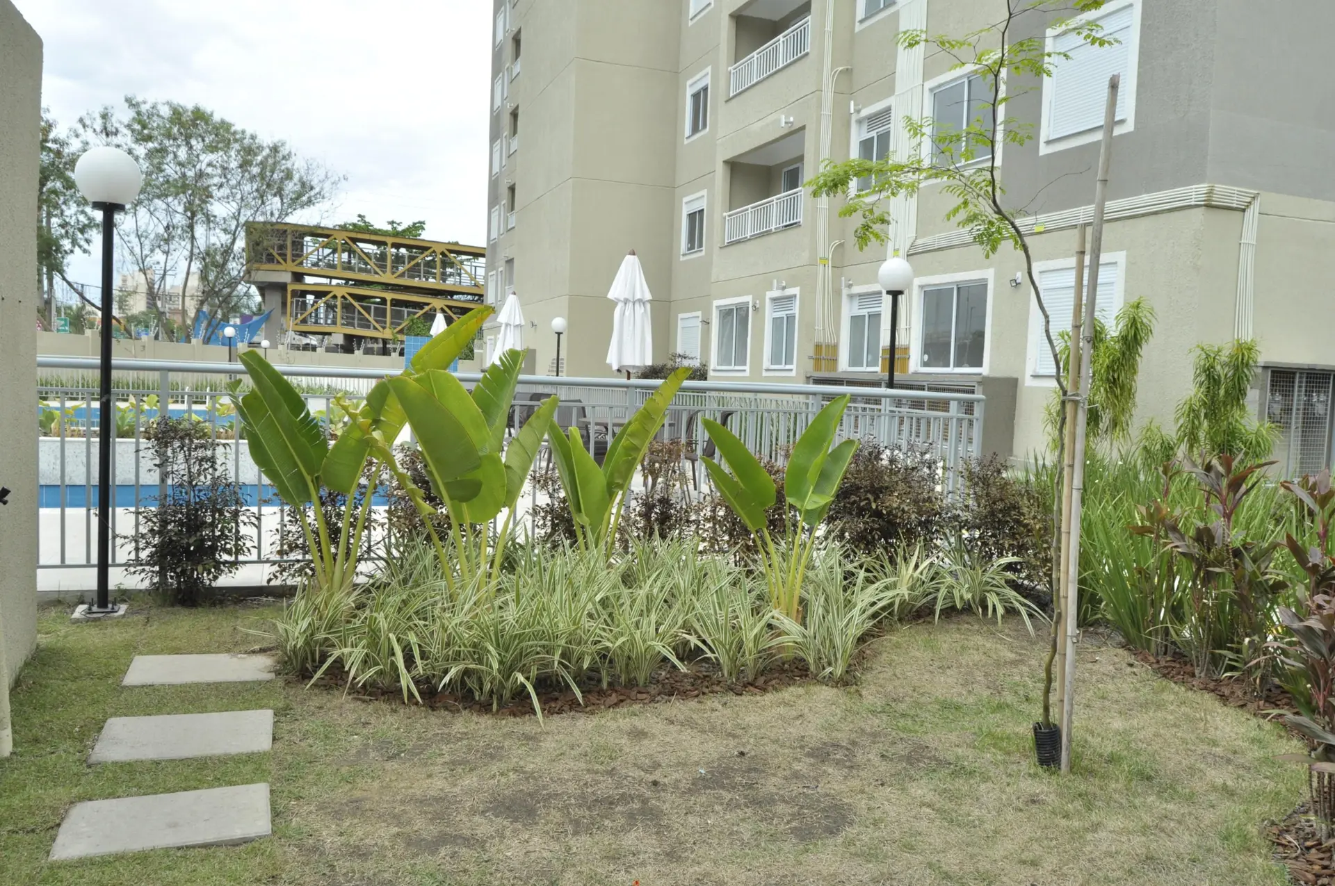2-bedroom apartment in a building with a pool — photo 5