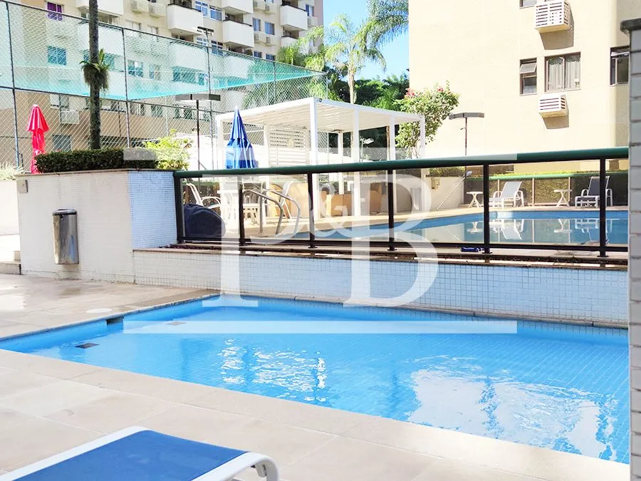 2-bedroom apartment in a building with a pool — photo 4